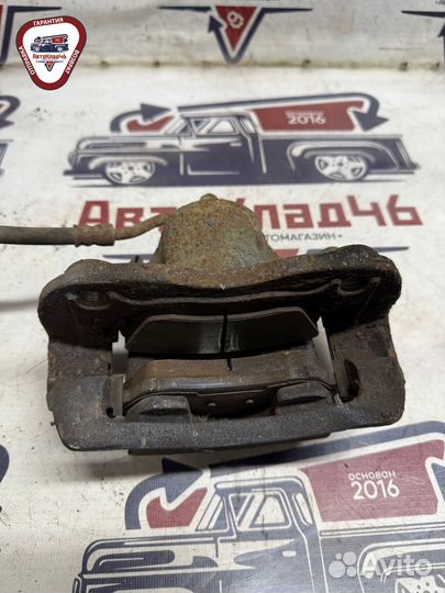 Суппорт тормозной передний левый Hyundai / Kia