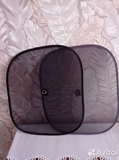 Сетка защита стекла от солнца в автомобиле