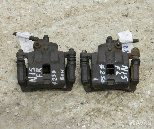 Суппорт передний Nissan Almera N15