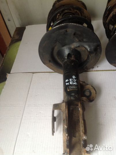 Амортизатор передний Geely emgrand x7