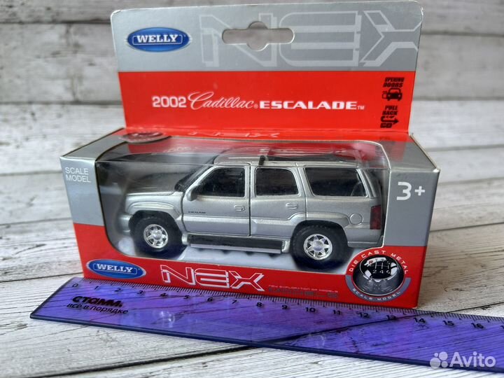 Модель автомобиля cadillac escalade машинка