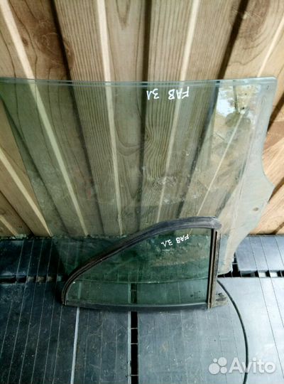 Стекло заднее левое skoda Fabia 1