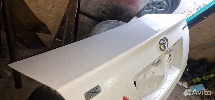 Капот задний corolla 2005