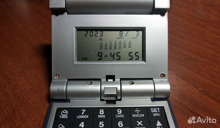 Калькулятор-трансформер с календарем, часами