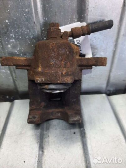 Суппорт тормозной задний правый Hyundai Tucson 1