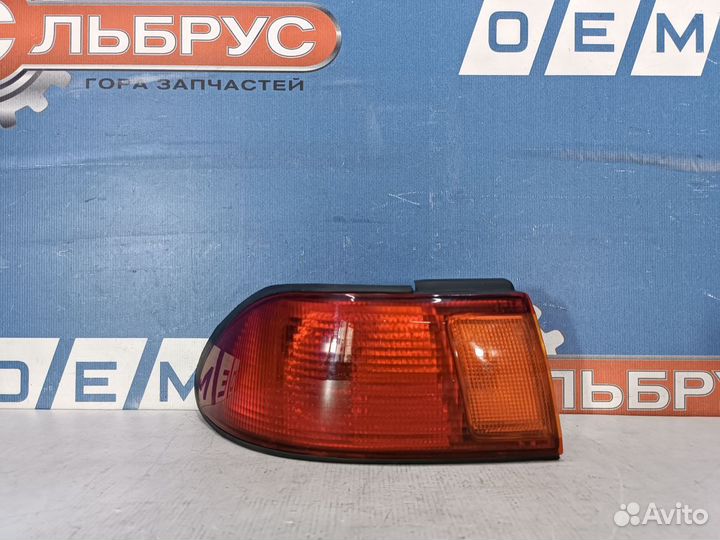 Фонарь левый внешний Nissan Sunny Б14 1993 1999