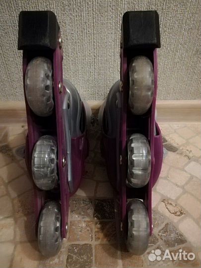 Роликовые коньки