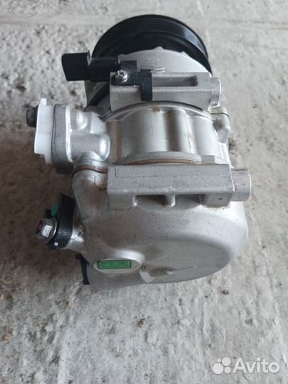 Компрессор кондиционера 977012P400