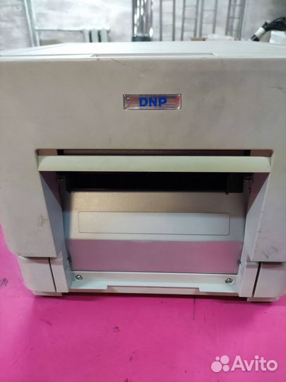 Принитер DNP DS-RX1 в кофре для перевозки