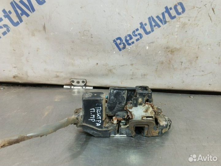 Замок передней правой двери Kia Spectra седан S6D1