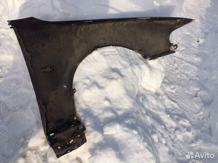 Крыло переднее левое Mazda 626 GE 91-97 гг