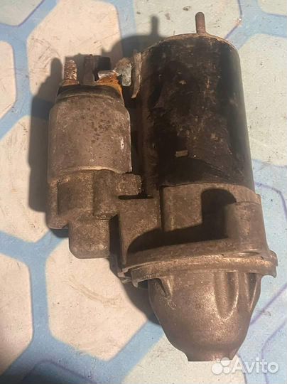 Стартер 06B911023A