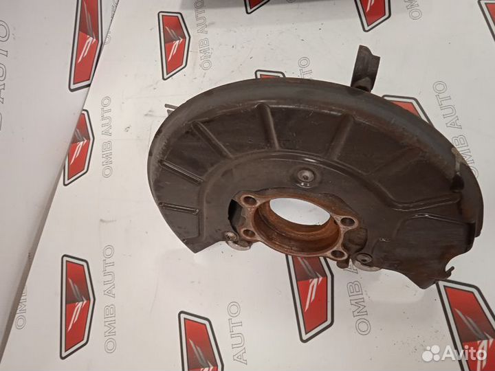 Кулак поворотный передний левый Гольф 6