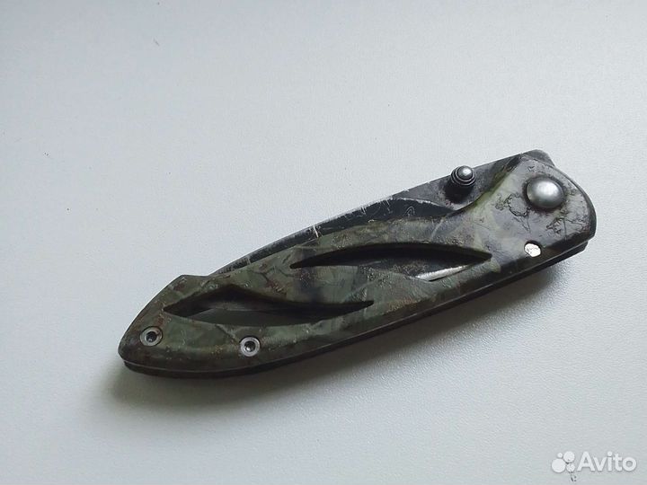 Нож складной смазаный