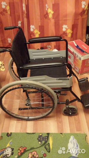 Инвалидная коляска с ручным приводом