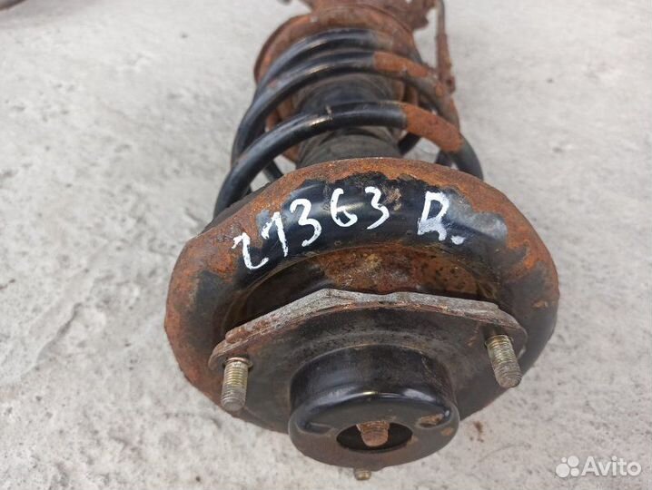 Стойка подвески передняя правая Nissan Primera P12