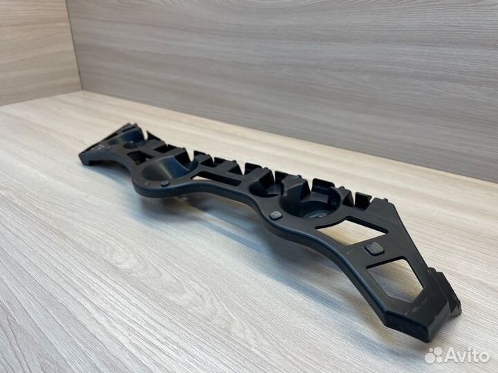 Кронштейн бампера задний левый Renault Logan