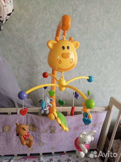 Детский мобиль в кроватку музыкальный