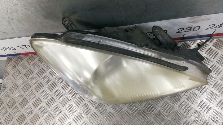 Фара Mitsubishi Lancer 9 (2003-2009)