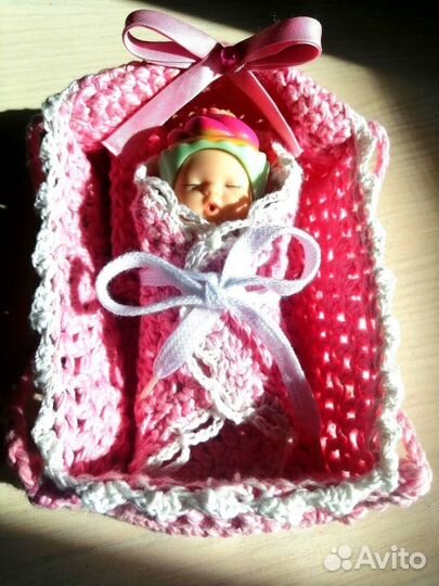 Пупсик в люльке