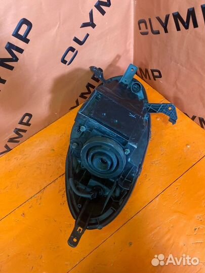 Фара левая Nissan March AK12 CR12