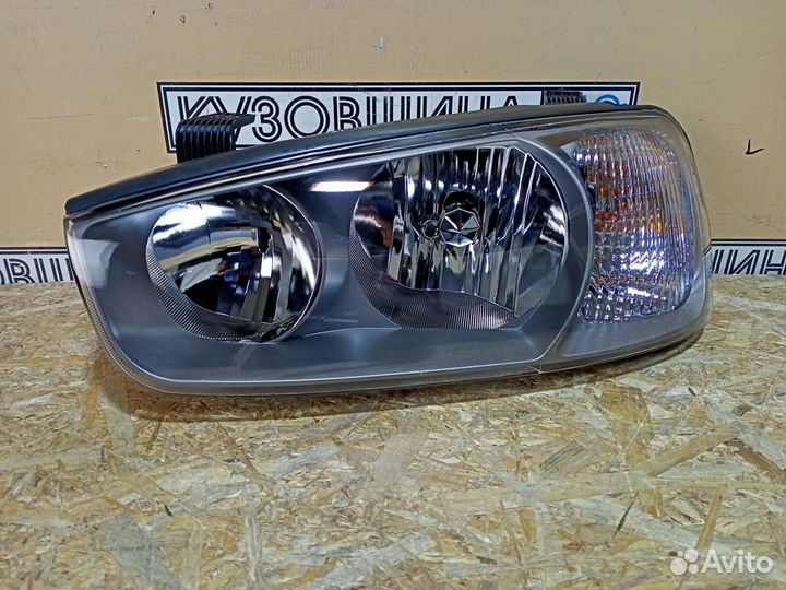 Фара левая Hyundai Elantra XD (00-03г) М/К черная