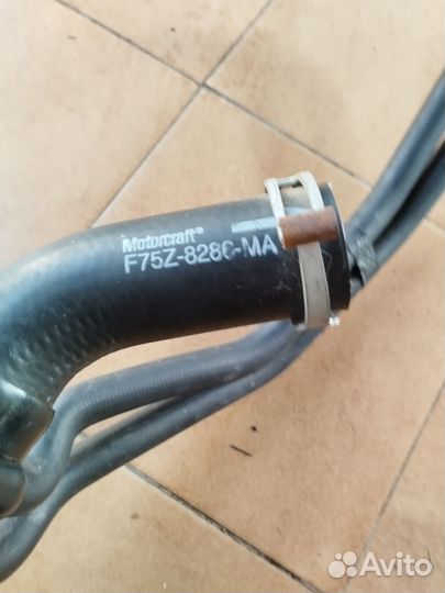 Патрубок радиатора Ford