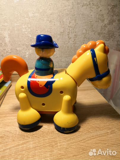 Лошадь с ковбоем игрушка музыкальная