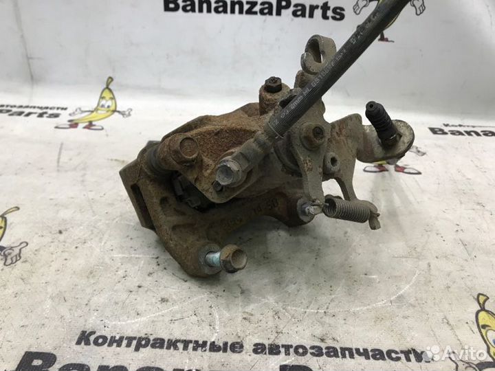 Суппорт тормозной задний левый Mazda Cx-5 KE