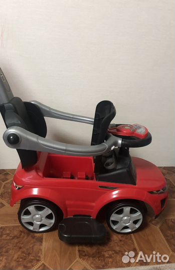 Машинка каталка с ручкой