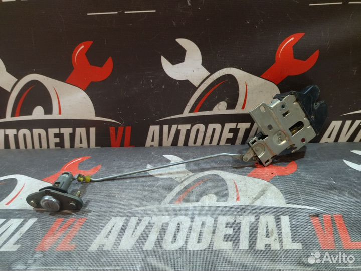 Замок крышки багажника Mitsubishi Lancer 9