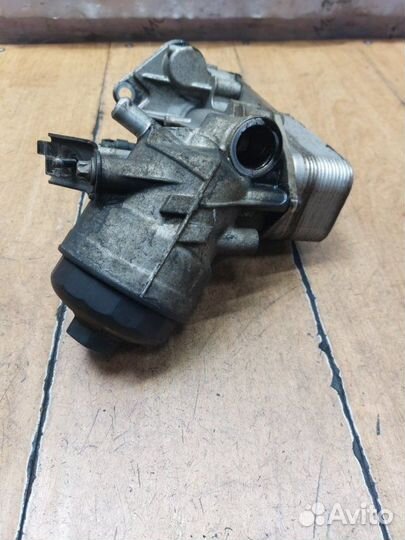 Корпус масляного фильтра Opel Zafira B A17DTR