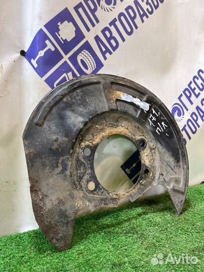 Кожух тормозного диска передний левый Nissan Teana