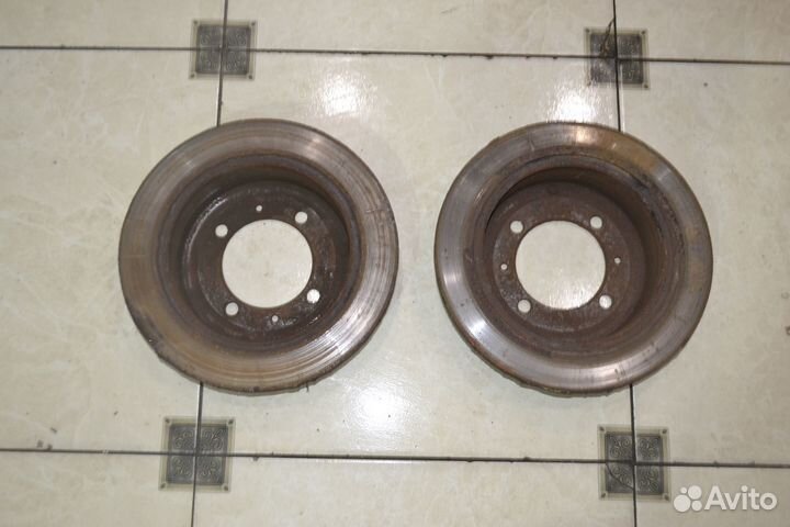 Тормозной диск задний Mitsubishi Lancer 9