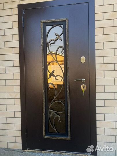 Коттеджная дверь Ковка