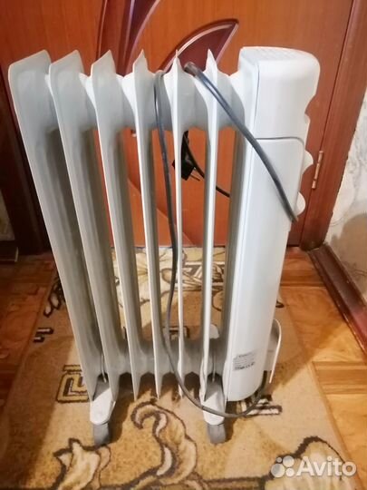 Масляный обогреватель