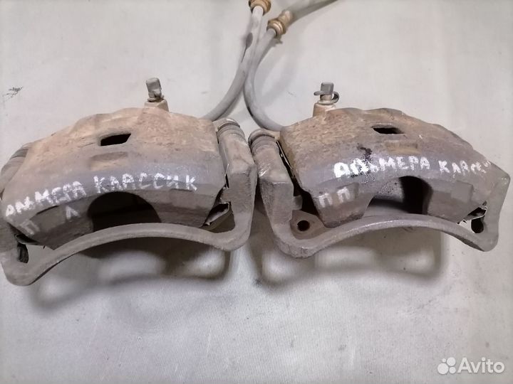 Суппорт тормозн.передн.Nissan Almera N15 CD20 1997