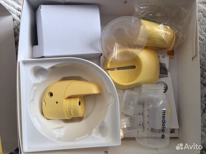 Молокоотсос medela электрический
