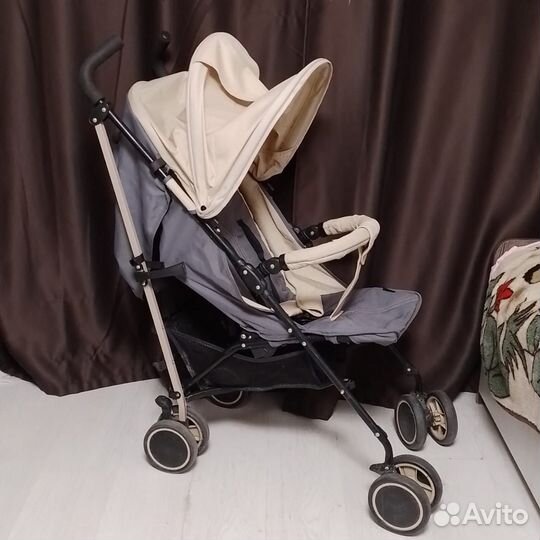 Прогулочная коляска трость