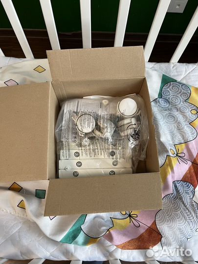 Детская кроватка с маятником