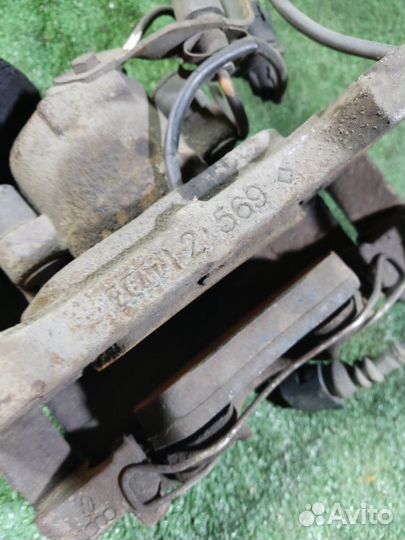 Суппорт тормозной передний левый Audi A6 C6