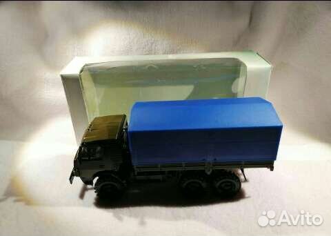 Камаз 43101-010 с синим тентом, зеленого цвета