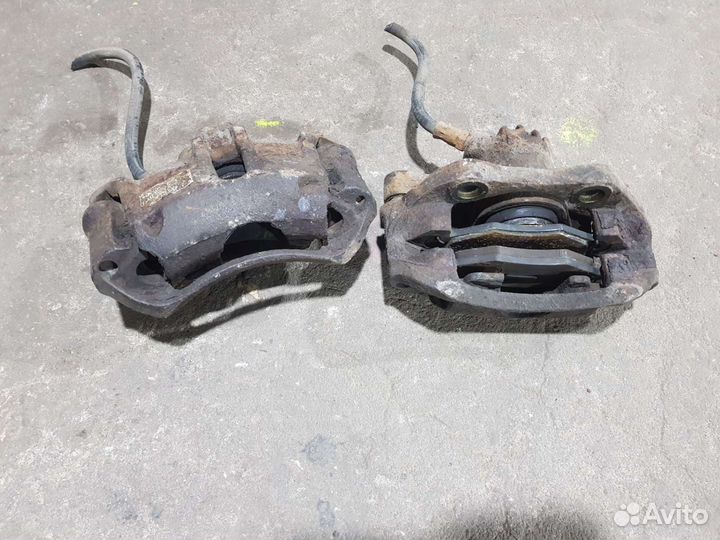 Суппорт тормозной левый Peugeot 206