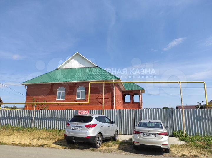 Коттедж 266 м² на участке 9,5 сот.