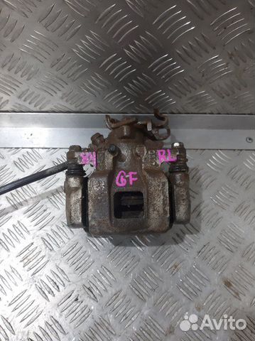 Суппорт задний левый Mitsubishi Outlander GF0W