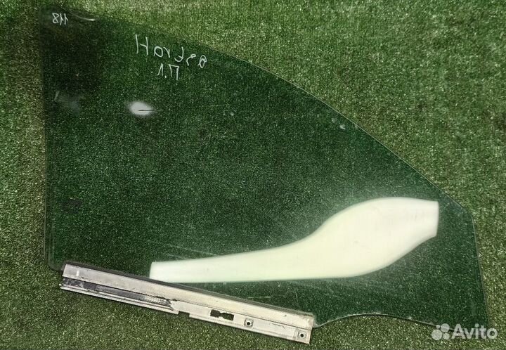 Стекло двери передней левой Opel Astra H