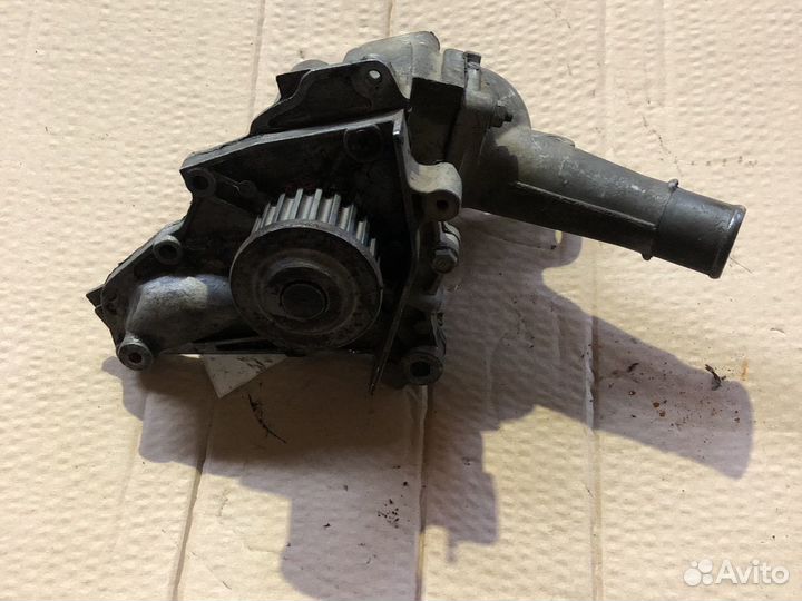 Помпа с корпусом термостата Toyota 3S-GE