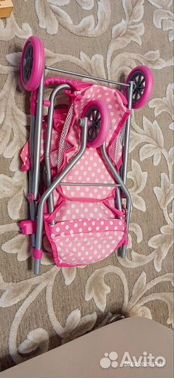 Детская игрушечная коляска