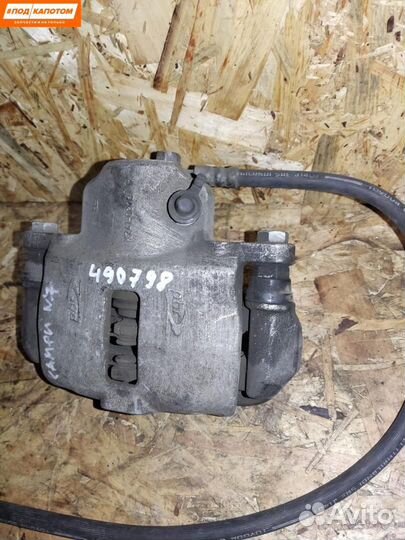 Суппорт тормозной задний правый Toyota Camry XV40