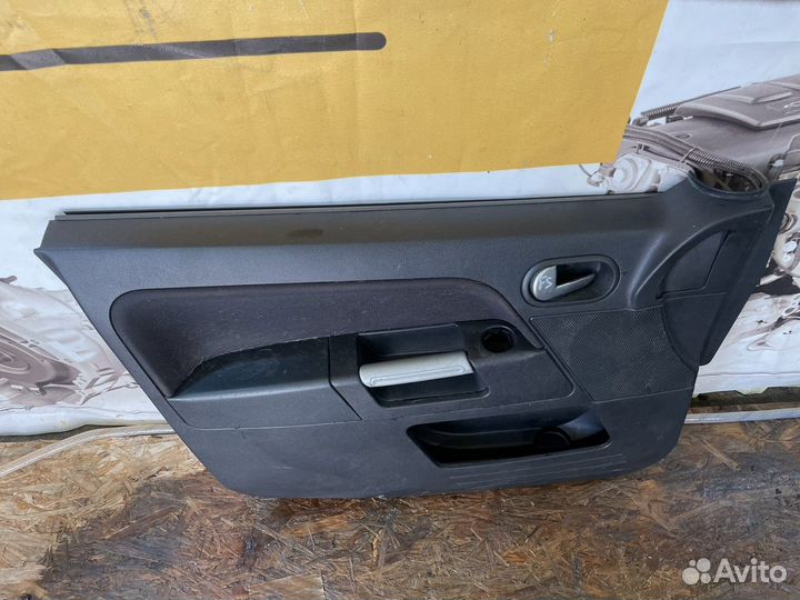 Обшивка двери Форд Фьюжен передняя левая